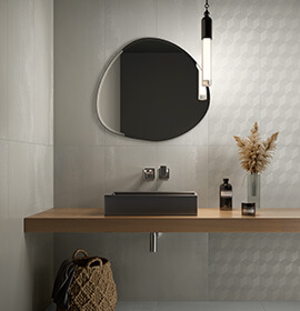Faïence mélant des effets métal et béton pour une décoration unique et contemporaine, aux finitions nobles.